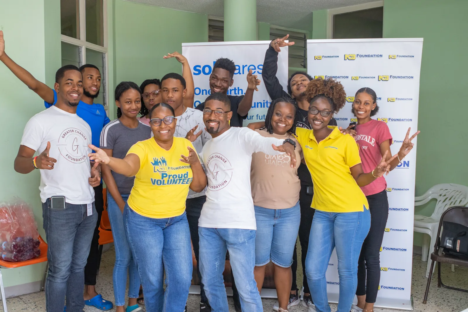 Participants gathered in front of banners at the GCF blood drive