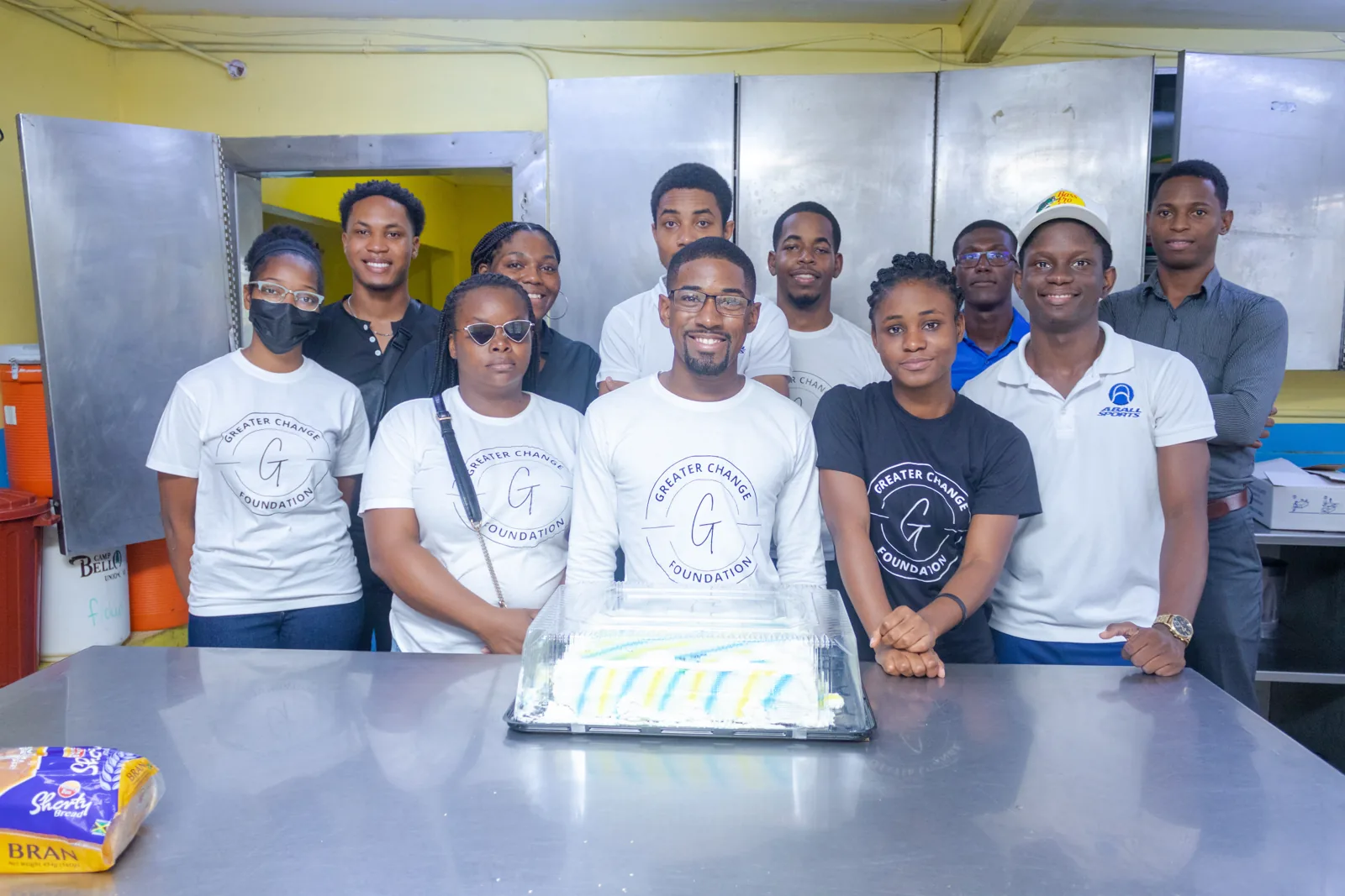 The Christmas initiative team gathered together in the kitchen
